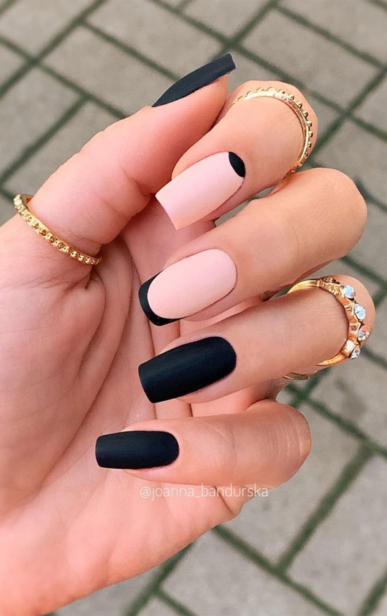 Mix and matched nude pink and matte black nails