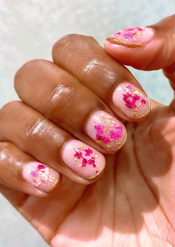 Pressed flowers gel nails with gold accent