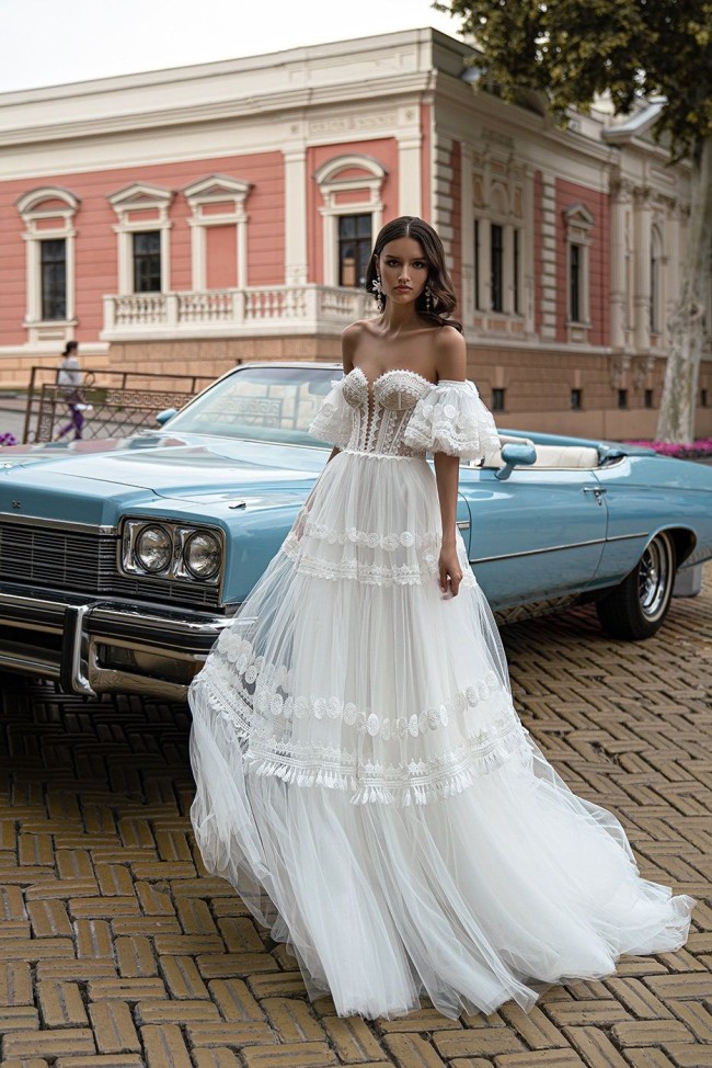 45 Fabulous Wedding Dresses in 2022 — Boho-style wedding dress with open shoulders